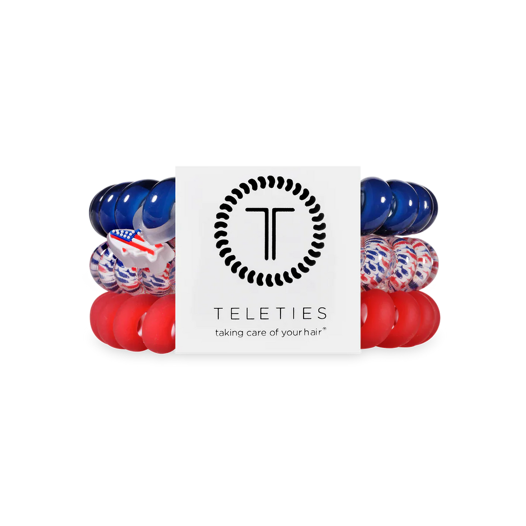 Set of red, blue, and white hair ties with 'Teleties' branding on a white background