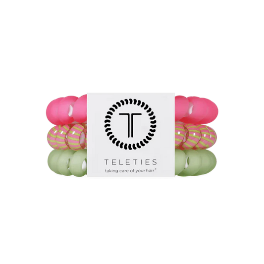 Set of 3 hair ties hat are green pink and striped. 