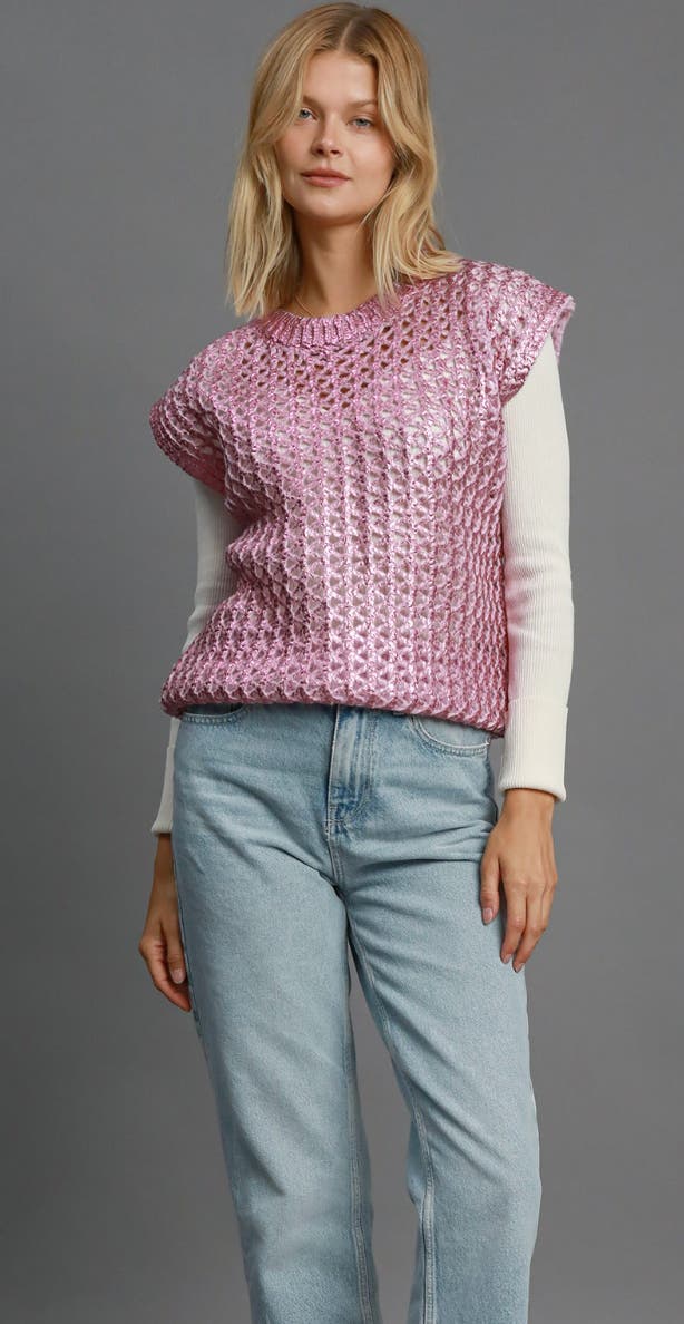 Sleeveless metallic sweater vest layered outfit