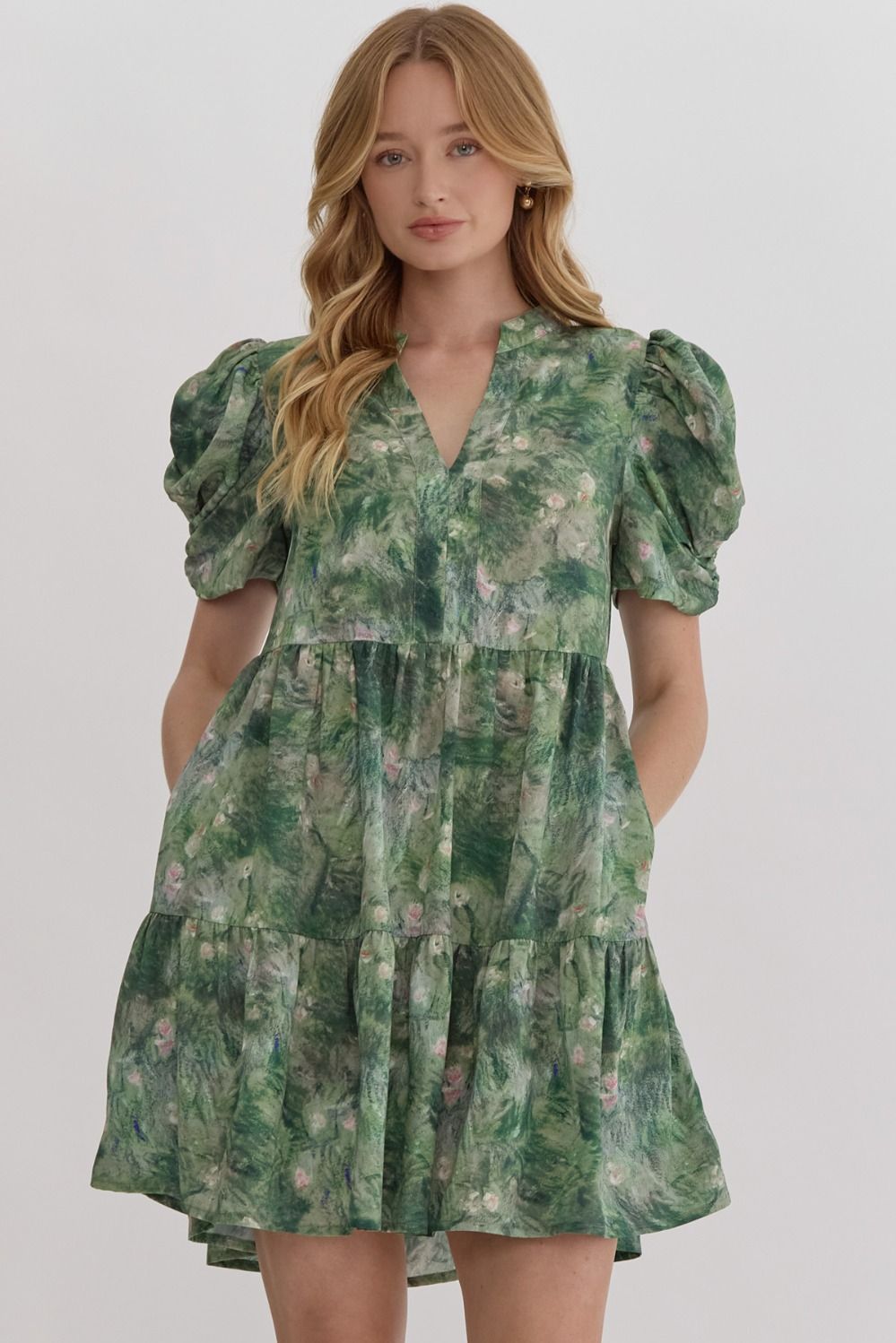Front view of floral print v-neck mini dress with puff sleeves